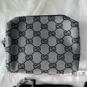 Coach and Gucci mini pouch bags